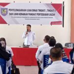 Sekda Bolmong Tahlis Gallang buka kegiatan ujian dinas dan penyesuaian ijazah di gedung CAT Pemkab Bolmong, beberapa waktu lalu