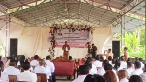Buka Rapat Kerja APDESI, Pj Bupati Bolmong Minta Kepala Desa Tingkatkan Inovasi