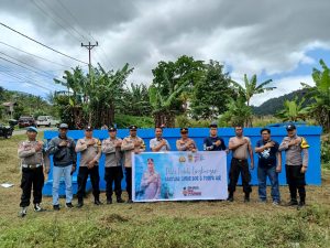 Polsek Modayag Gelar Kerja Bakti dan Salurkan Bantuan Kepada Masyarakat Desa Sumber Rejo