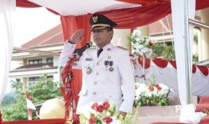 Pj Bupati Jusnan Calamanto Mokoginta Pimpin Upacara HUT Ke-79 Republik Indonesia
