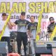 Alsintan dibagikan Polres Kotamobagu kepada Petani di Momen Jalan Sehat Hari Bhayangkara ke-79