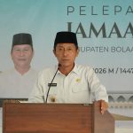 Bupati Iskandar Kamaru saat menyampaikan pesan dan doa dalam acara pelepasan 21 Jemaah Calon Haji di Kantor Kemenag Bolsel, Rabu (29/4/2026).