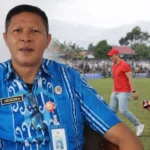 Kepala Bidang Olahraga Kotamobagu, Hendra Mokoagow, saat memberikan keterangan terkait rencana pelaksanaan Pekan Olahraga Kota (Porkot) sebagai ajang seleksi atlet menuju Porprov 2027, di sela kegiatan olahraga masyarakat di Kotamobagu.