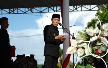 Praktik Jual Beli Lahan Ilegal di Bolsel, Bupati Iskandar Ultimatum Camat dan Sangadi 3 Bupati Bolsel Iskandar Kamaru menyampaikan ultimatum kepada camat dan sangadi agar tidak terlibat dalam praktik jual beli lahan ilegal saat Rapat Paripurna DPRD Bolsel di Panango.