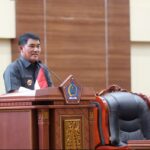 Gubernur Yulius Selvanus, menyampaikan laporan pertanggungjawaban APBD 2025 dalam Rapat Paripurna DPRD Sulut, Selasa (23/6/2026).