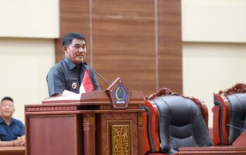 Gubernur Yulius Selvanus, menyampaikan laporan pertanggungjawaban APBD 2025 dalam Rapat Paripurna DPRD Sulut, Selasa (23/6/2026).