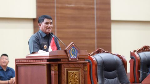 Gubernur Yulius Selvanus, menyampaikan laporan pertanggungjawaban APBD 2025 dalam Rapat Paripurna DPRD Sulut, Selasa (23/6/2026).