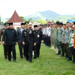 Wabup Bolsel Deddy Abdul Hamid bersama jajaran Forkopimda menghadiri upacara HUT Bhayangkara ke-80 di Lapangan Alun-Alun Molibagu, Kecamatan Bolaang Uki, Rabu (1/7/2026).