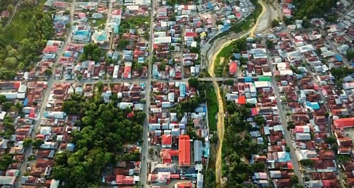 Kondisi kawasan pemukiman warga di Kecamatan Kotabunan, Kabupaten Bolaang Mongondow Timur, yang kini masuk ke dalam plot area Izin Usaha Pertambangan (IUP) Blok Doup.