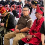 Kapolres Boltim AKBP Golfried Hasiholan Pakpahan saat menghadiri pelantikan Pengurus Ormas Adat dan Budaya Waraney Tanah Toar Lumimuut (TTL) periode 2026–2031 di Kota Manado, Sabtu, 25 Juli 2026.