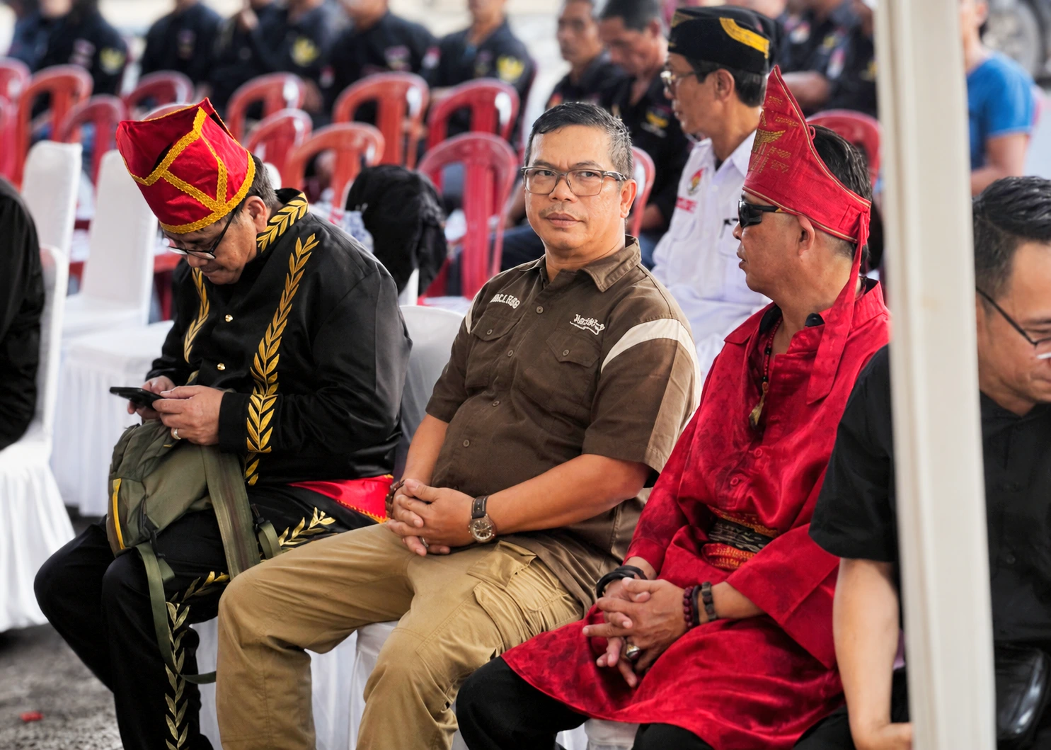 Kapolres Boltim AKBP Golfried Hasiholan Pakpahan saat menghadiri pelantikan Pengurus Ormas Adat dan Budaya Waraney Tanah Toar Lumimuut (TTL) periode 2026–2031 di Kota Manado, Sabtu, 25 Juli 2026.