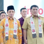 Gubernur Yulius Selvanus bersama Menteri Agama RI Prof. Dr. KH. Nasaruddin Umar saat menghadiri pembukaan MTQ XXXI Tingkat Provinsi Sulut di Alun-alun Pemkab Minahasa Utara, Senin (6/7/2026).
