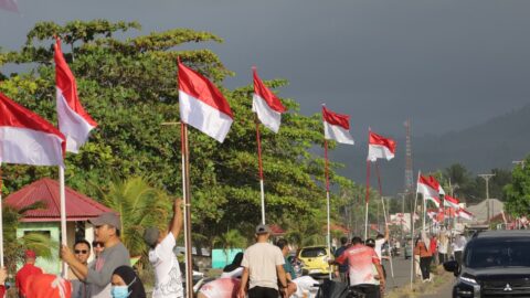 Sambut HUT Ke-81 RI, Pemkab Bolsel Gelar Apel dan Aksi Merah Putih di Pantai Sondana