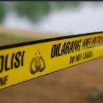 Polsek Lolayan memasang garis polisi di salah satu lokasi tambang manual di Desa Tanoyan Utara, Kecamatan Lolayan, Bolaang Mongondow.