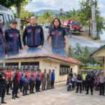 Personel Tim URC Resmob Polres Bolmong bersiaga saat mengikuti patroli show of force jelang Pengucapan Syukur di Dumoga Raya, Sabtu, 22 Agustus 2026. Foto: Resmob Bolmong Raja Bogani