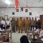 Wakil Bupati Bolsel Deddy Abdul Hamid meninjau penyaluran perdana Program Makan Bergizi Gratis di SPPG Desa Deaga, Pinolosian Tengah, Selasa, 15 September 2026. Foto: Diskominfo Bolsel