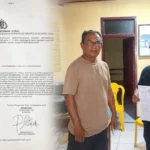 Icuk Sugiarto menunjukkan dokumen laporan polisi usai melaporkan FP alias Fredy Pitoy ke Polsek Modayag terkait dugaan pengancaman menggunakan pisau di Jalan Raya Desa Tobongon, Kecamatan Modayag, Boltim, Kamis, 24 September 2026. Foto: Eges/Sulutplus
