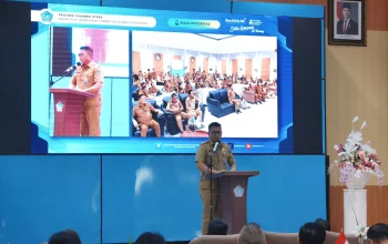 Tahlis Gallang Dorong Peningkatan Kompetensi ASN Lewat BAKU BEKING PANDE 3 Sekdaprov Sulut Tahlis Gallang saat memberikan sambutan dan meluncurkan program pelatihan digital ASN BAKU BEKING PANDE YSK-VICTORY di Kantor BPSDM Provinsi Sulut, Manado, Senin, 26 Oktober 2026. Foto: Istimewa